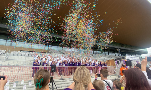 People celebrating with confetti at a Relay for Life event